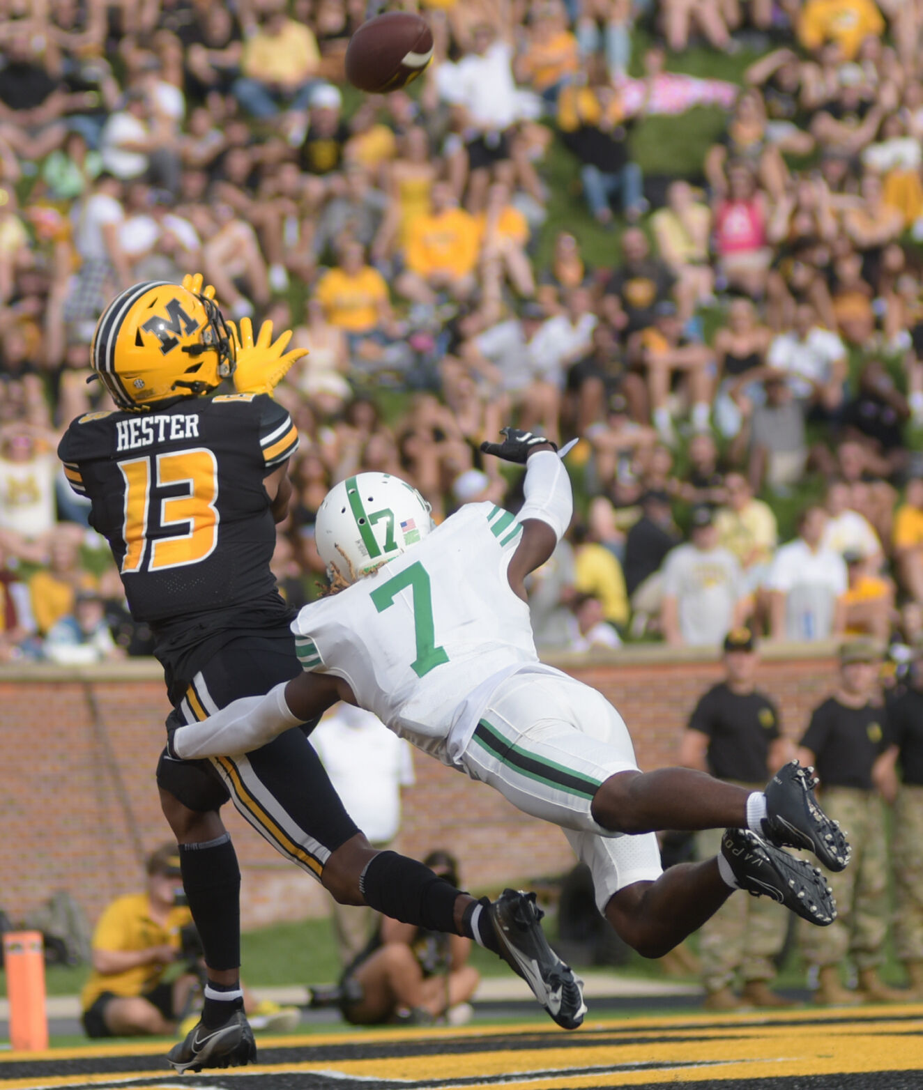 JJ Hester reaches to catch the ball